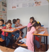 Teacher working with a child
